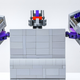 A close-up of the head and shoulders of a transforming robot that turns into a Super Nintendo.